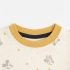 Close-up of character print pattern and contrast mustard collar stitching - Co Kids Wear